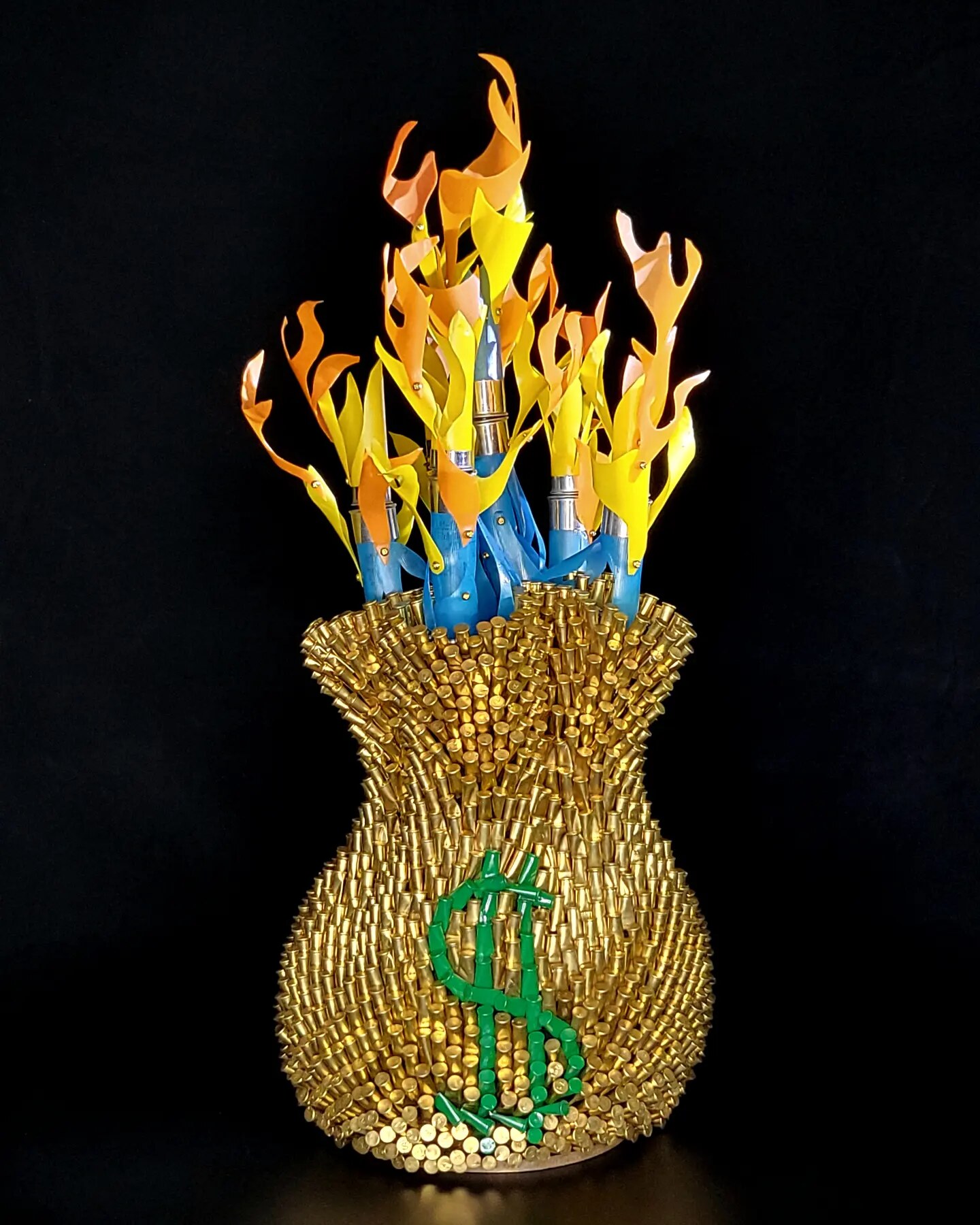 Fire Power money bag sculpture made from bullet casings